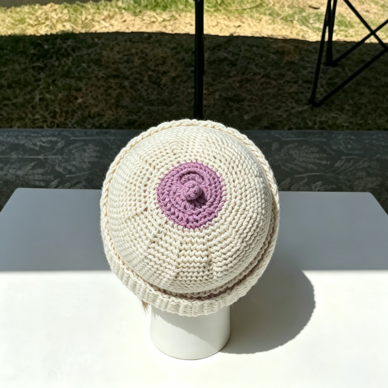Beanie with a small top knot