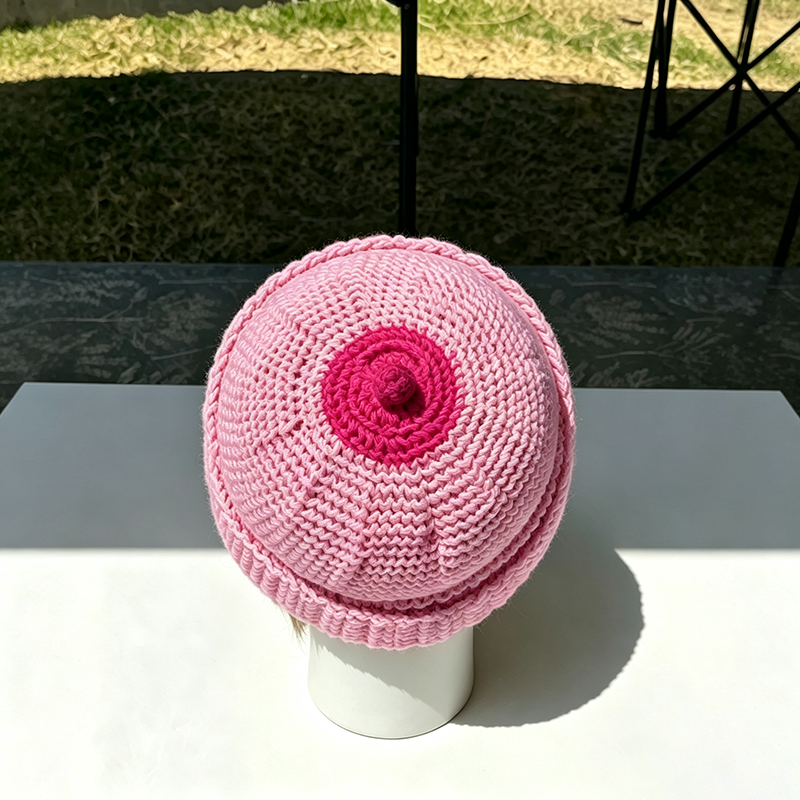 Beanie with a small top knot