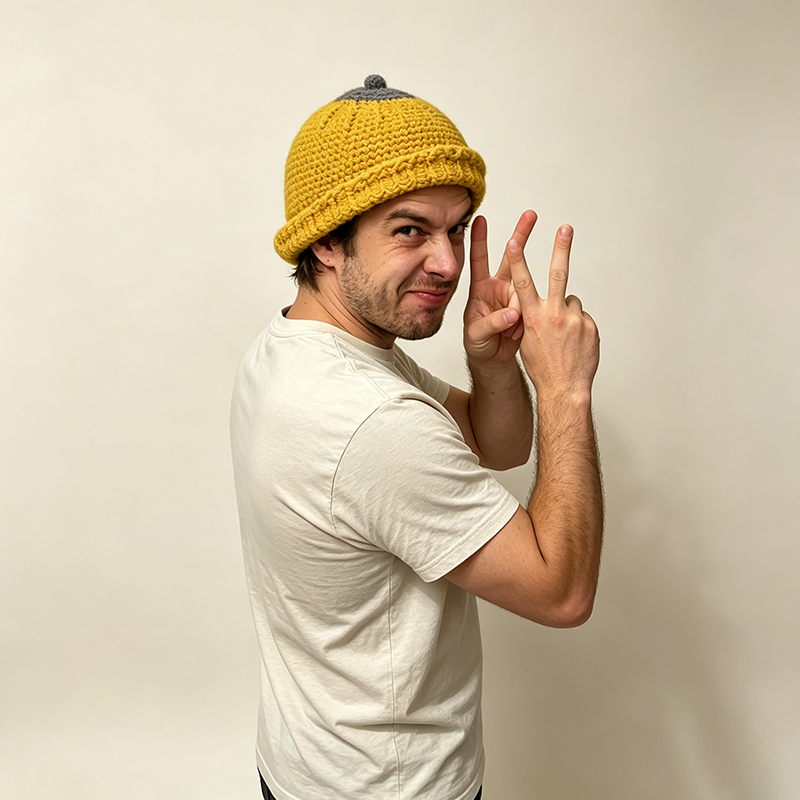 Beanie with a small top knot