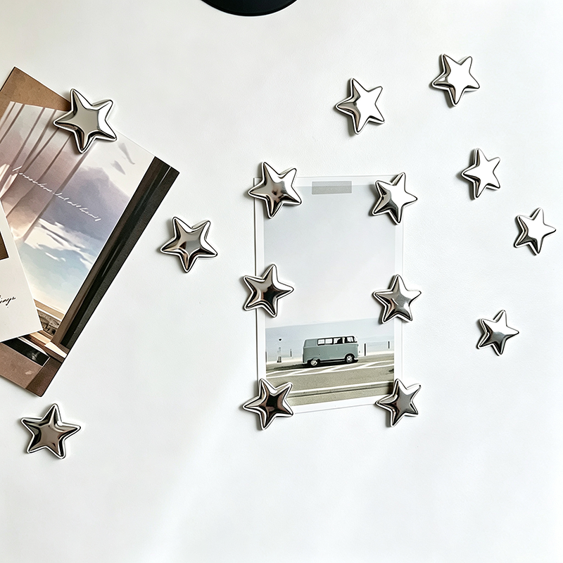 Silver star-shaped decorative fridge magnet