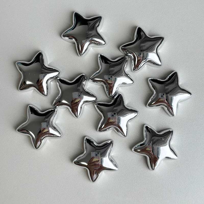 Silver star-shaped decorative fridge magnet