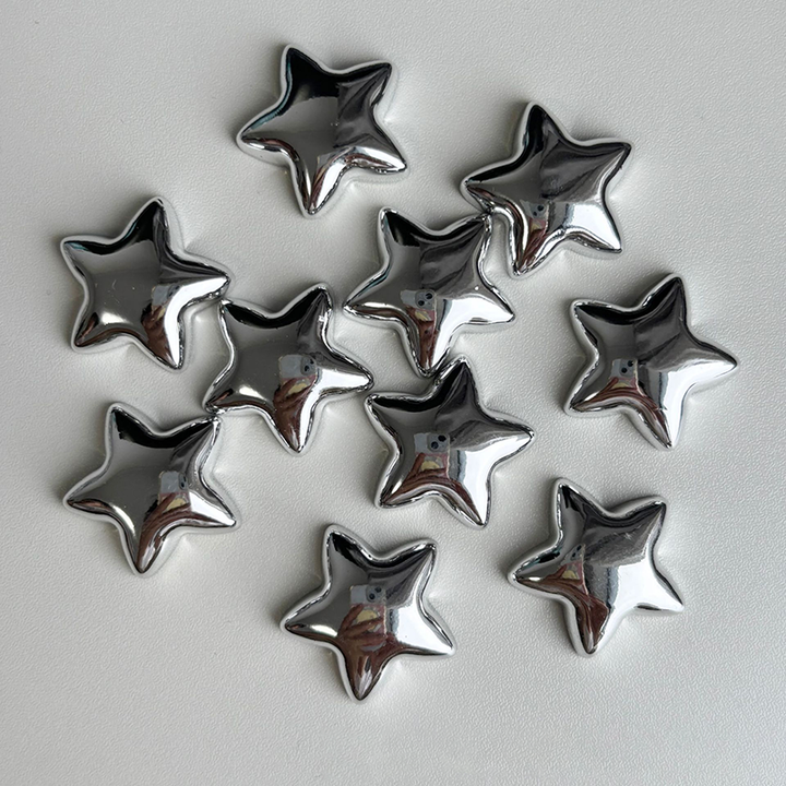 Silver star-shaped decorative fridge magnet