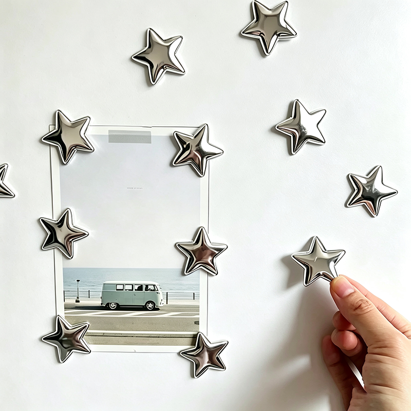 Silver star-shaped decorative fridge magnet
